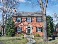 CHARMING BRICK COLONIAL ON A SPACIOUS CORNER LOT