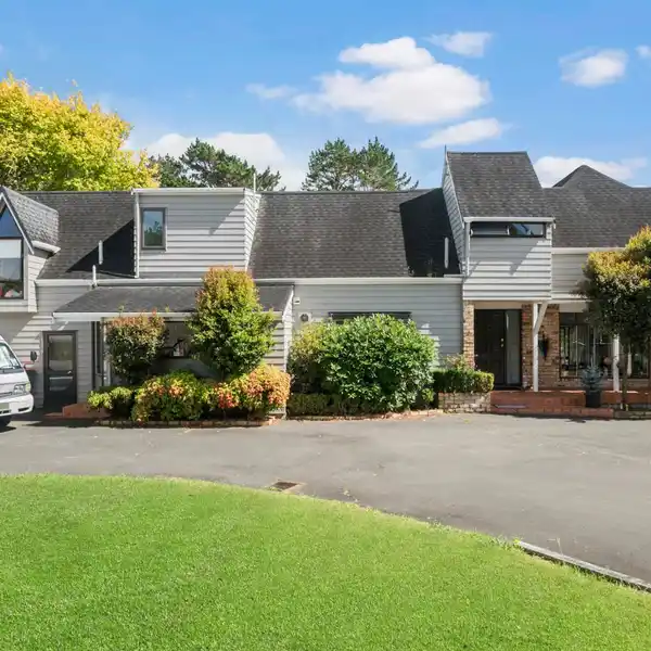 TWO COUNTRY-STYLE HOMES ON FIVE ACRES