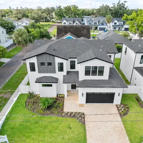 CONTEMPORARY LUXURY ON A PREMIER CORNER LOT