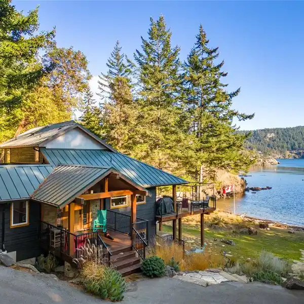 GORGEOUS CUSTOM HOME WITH RARE WALK-ON WATERFRONT
