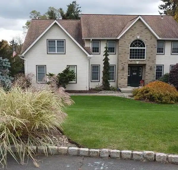 STANDOUT CENTER HALL COLONIAL