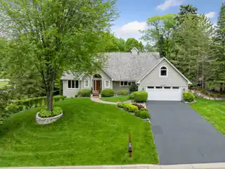 Meticulously Maintained Wayzata Home on a Serene, Private Lot