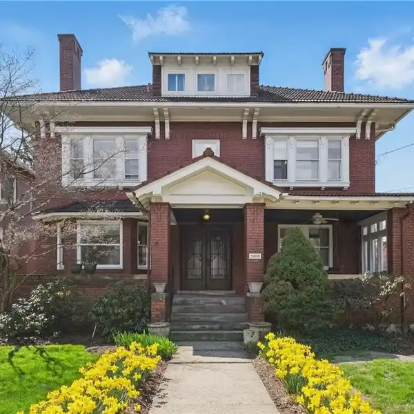 BRICK CENTER HALL HOME WITH HISTORICAL DETAILS