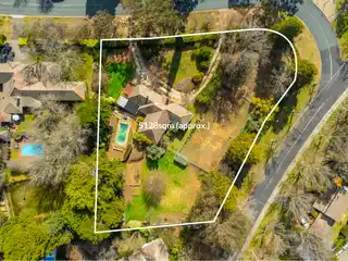 Timeless Elegant Red Brick Forrest Home