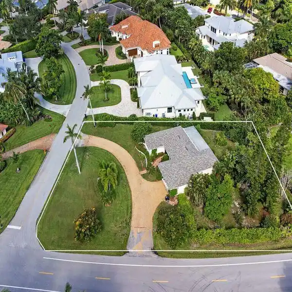 OVERSIZED CORNER LOT IN EXCELLENT POSITION