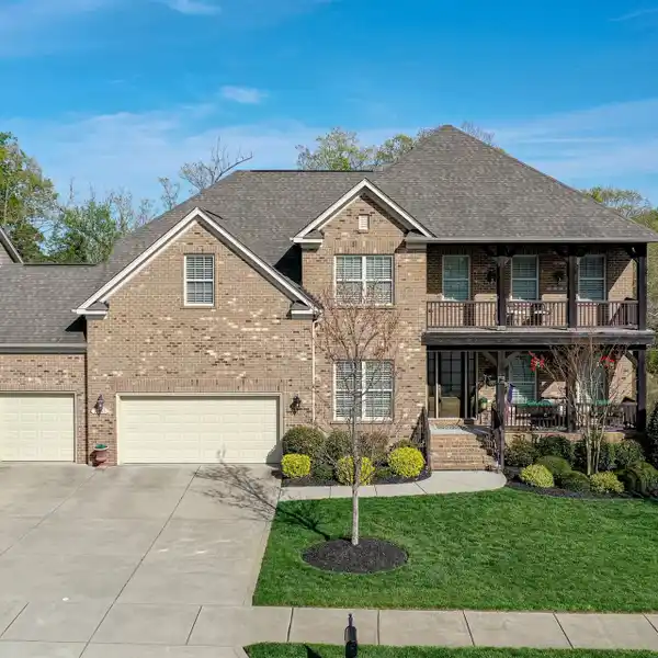 EXQUISITE HOME ON A PRIVATE WOODED LOT