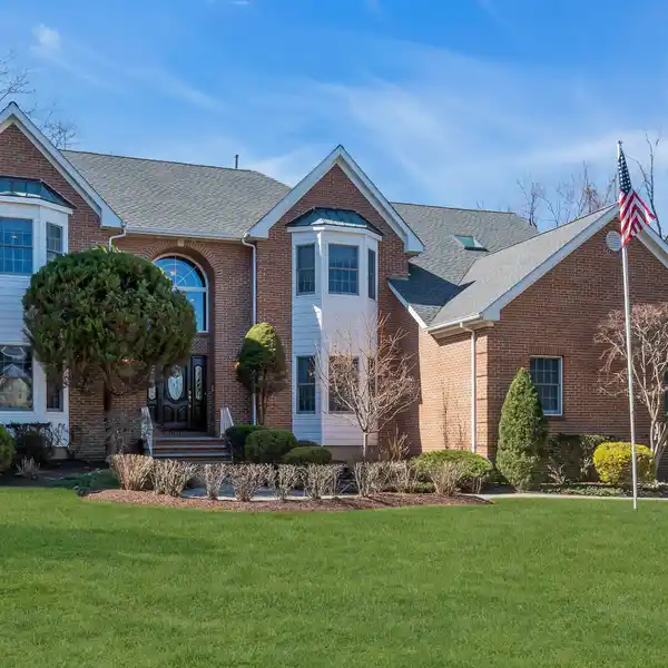 STUNNING CENTER HALL COLONIAL IN COVETED LOCATION