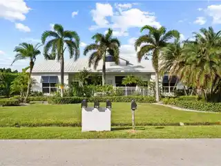 Turnkey Naples Park Investment with Lush Outdoor Space