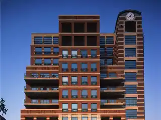 Panoramic Luxury Living: Corner Unit with Spectacular Mountain and City Views in Riverfront Tower