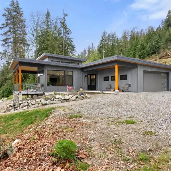 PRIVATE WATERFRONT ESTATE WITH SWEEPING CHANNEL VIEWS