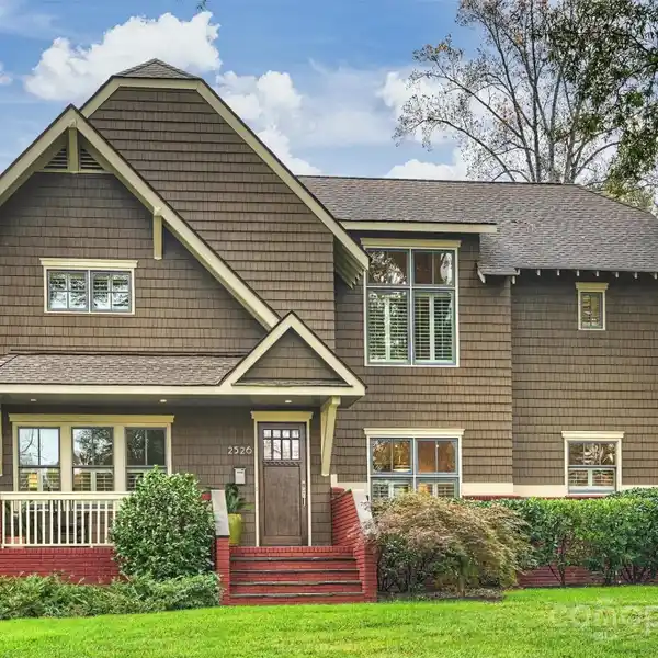 TIMELESS CRAFTSMAN EXTERIOR WITH THOUGHTFUL UPDATES THROUGHOUT