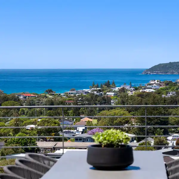 PANORAMIC OCEAN VIEWS WITH TIMELESS COASTAL ELEGANCE