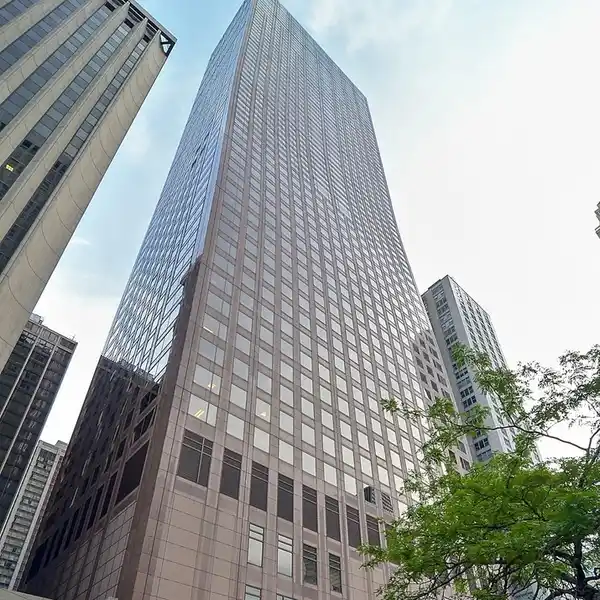 SKY-HIGH DUPLEX WITH FLOATING STAIRCASE AND LAKE VIEWS