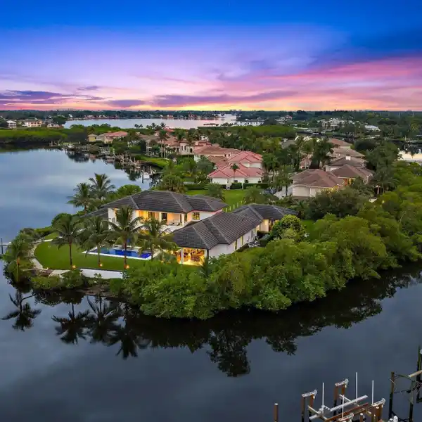 PREMIER JUPITER POINT-LOT ESTATE WITH EXPANSIVE OUTDOOR LIVING