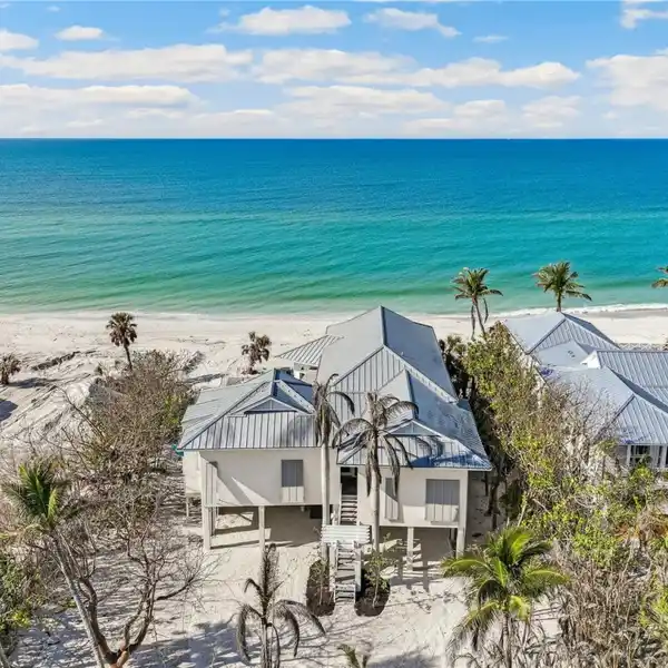 ELEVATED RESIDENCE ON AN EXCLUSIVE BEACHFRONT LANE