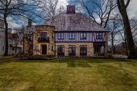 Prominent Stone and Brick English Country Home