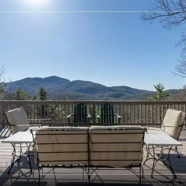 IMPRESSIVE LOG HOME WITH LONG-RANGE VIEWS