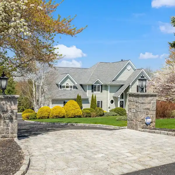 BEAUTIFULLY MAINTAINED CUSTOM-BUILT COLONIAL