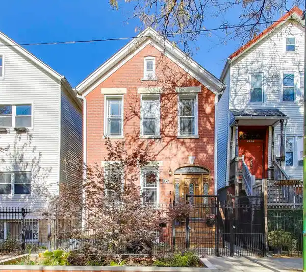 ELEGANT THREE-STORY HOME WITH GRAND ENTERTAINING SPACES