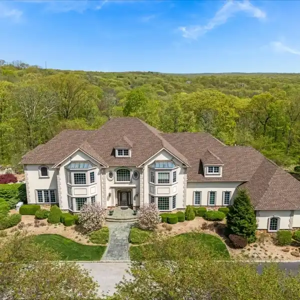 LUXURY ESTATE IN THE HEART OF SPARTA'S PREMIER NEIGHBORHOOD