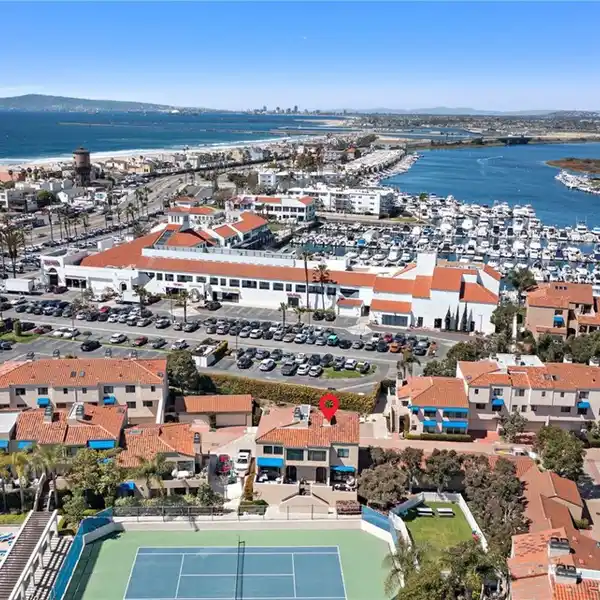 FINE CONDOMINIUM IN A SOUGHT-AFTER GUARD GATED ENCLAVE