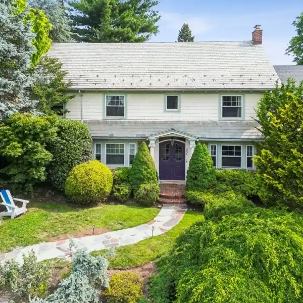 EXTRAORDINARY COLONIAL ON A SERENE LOT