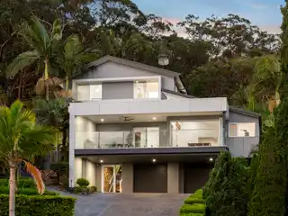 Beautifully Composed Home Surrounded by Tropical Gardens