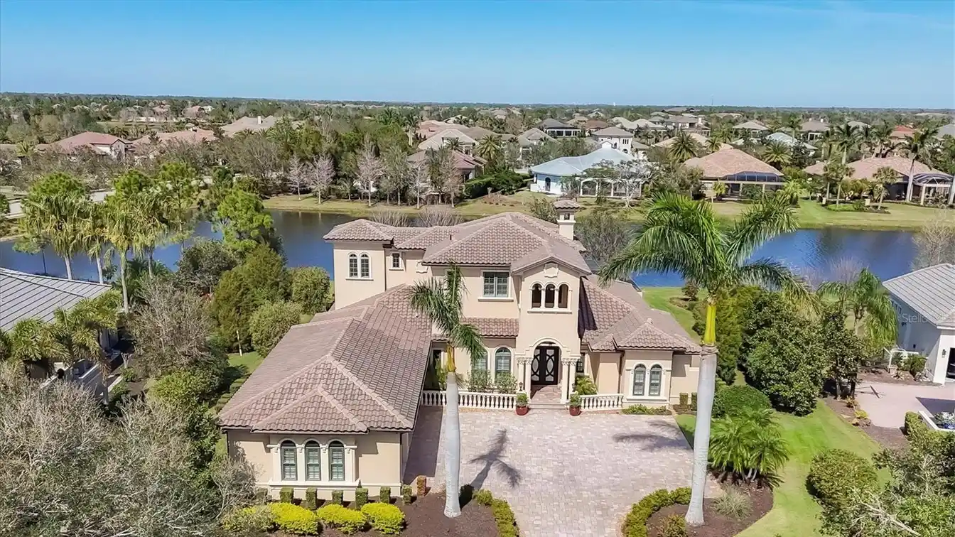 Meticulously Maintained Estate Home in the Exclusive Lake Club at Lakewood Ranch
