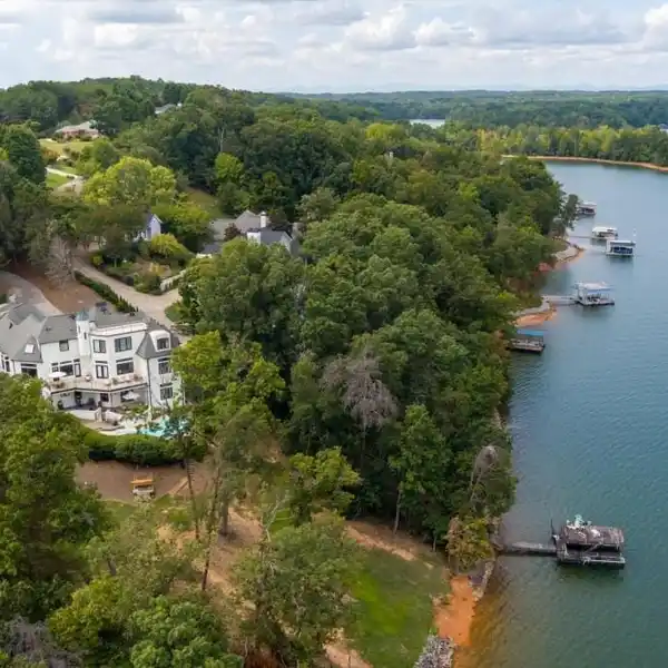 EXCLUSIVE LAKEFRONT ESTATE OFFERING SERENITY, LUXURY, AND CONVENIENCE