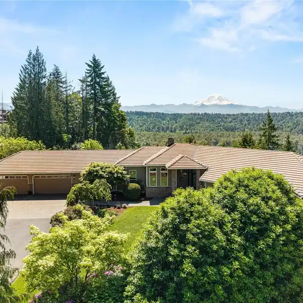 INCREDIBLE CUSTOM HOME ON 4.6 SERENE ACRES