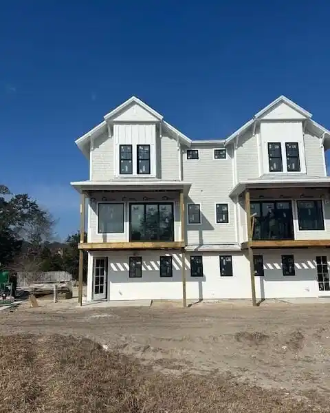LUXURY LIVING AMID WRIGHTSVILLE BEACH'S COASTAL CHARM