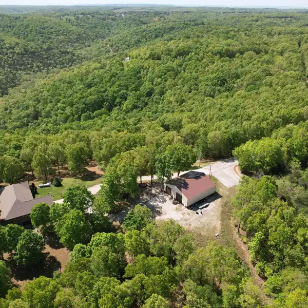 OZARK MOUNTAIN ESTATE WITH 80 ACRES
