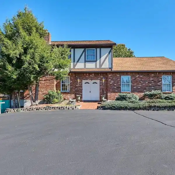 TUSCANY-INSPIRED BRICK BEAUTY ON 13 ACRES