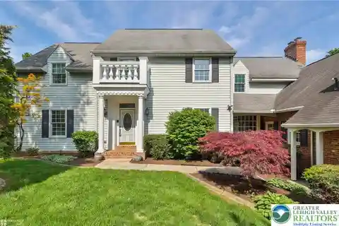 Elegant Parkland Home with Unique Hidden Rooms