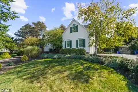 Upgraded Cul-De-Sac Colonial with Poolside Charm