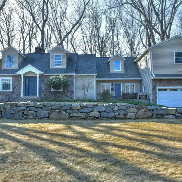 EXCEPTIONAL CENTER HALL COLONIAL IN THE HEART OF RAMSEY