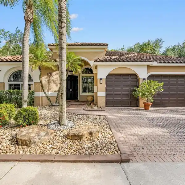 STUNNING ONE-STORY HOME IN GATED COMMUNITY