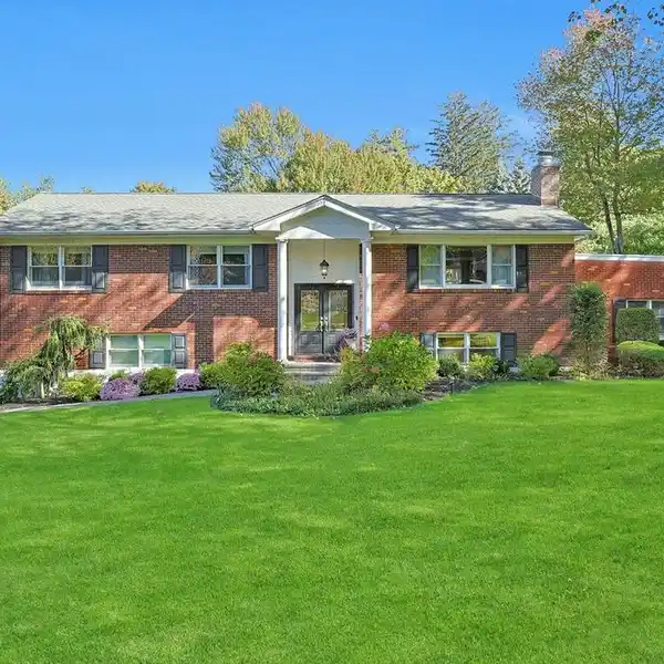 STUNNING BRICK RAISED RANCH