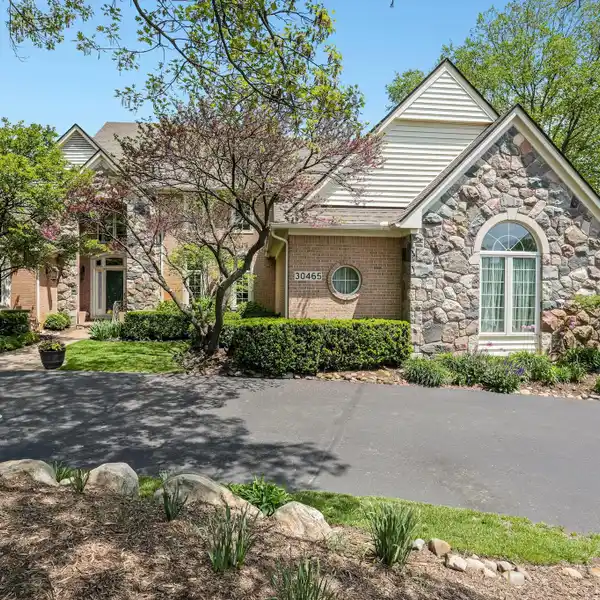EXPANSIVE AND EXCEPTIONAL BRICK AND STONE HOME