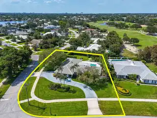 Country Club Living on a Prime Corner Lot
