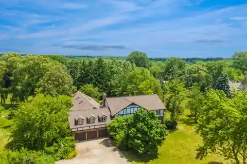 Expansive Tudor Escape with Indoor Heated Pool