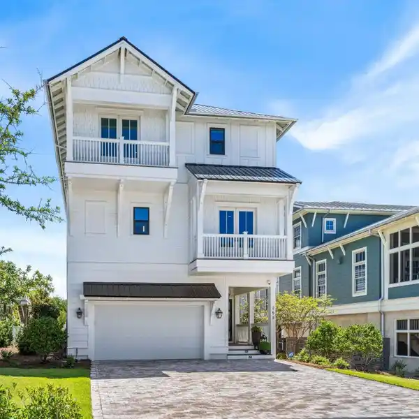 CONTEMPORARY COASTAL GEM WITH ROOFTOP SUNSET VIEWS