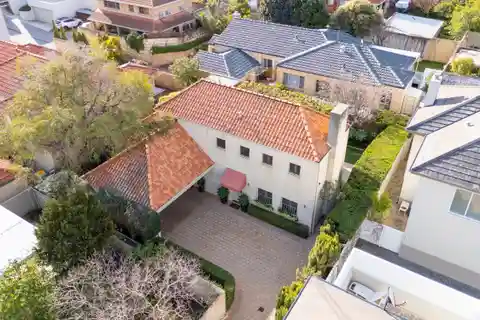 Private Driveway Leads to Elegant Family Retreat