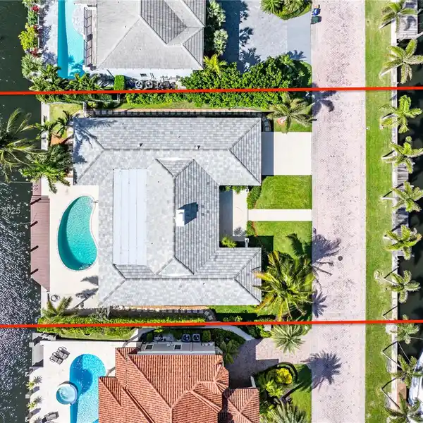 METICULOUSLY RENOVATED DOUBLE WATERFRONT ESTATE