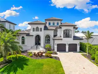 Exquisite Waterfront Home in the Prestigious Conners Community