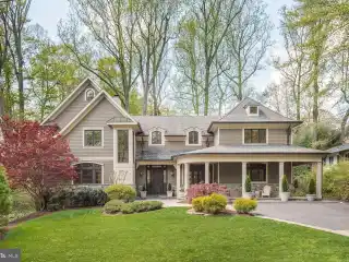 Custom Estate Nestled in Wooded Tranquility
