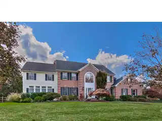 Exquisite six Bedroom Center Hall Colonial