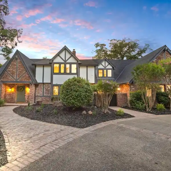 LUXURIOUS TUDOR-STYLE ESTATE ON MANICURED GROUNDS