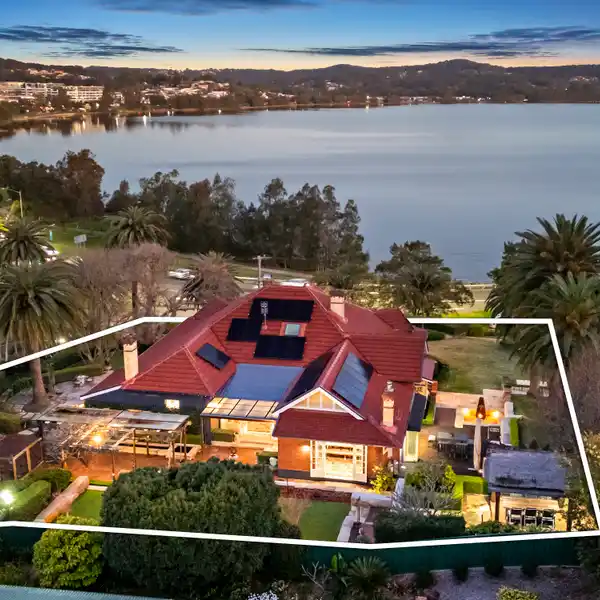 HIGH-SET RESIDENCE WITH CINEMATIC VIEWS ACROSS LAKE MACQUARIE