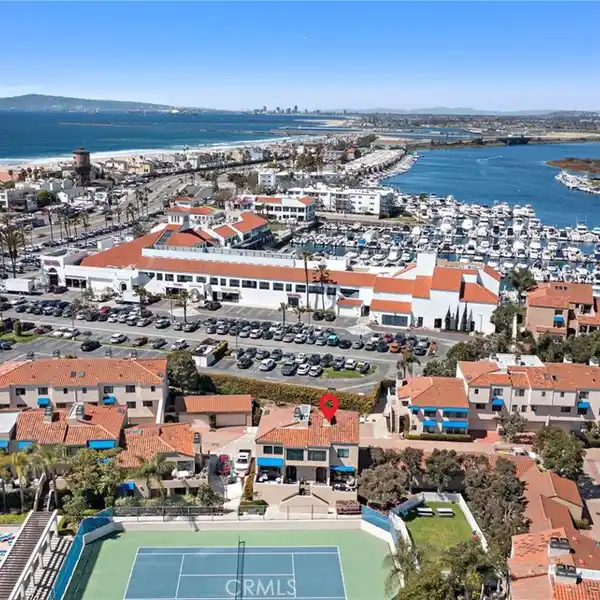 FINE CONDOMINIUM IN A SOUGHT-AFTER GUARD GATED ENCLAVE